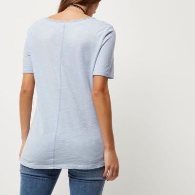 Light blue distressed V-neck T-shirt